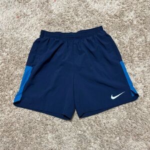 Nike navy blue shorts with blue accents Size Large